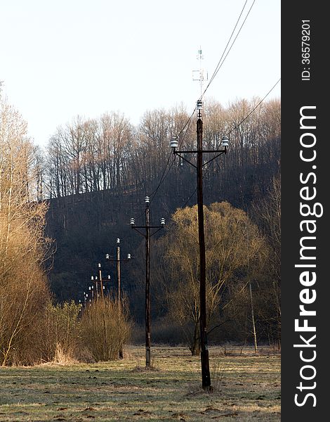 Wooden poles with the management of electrical energy. Wooden poles with the management of electrical energy