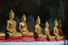 Six Sitting Golden Buddha In The Cave In Thailand Stock Photography Six Sitting Golden Buddha In The Cave In Thailand Stock Photography