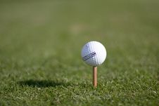 A Golf Ball On An Unusual Tee Royalty Free Stock Photos
