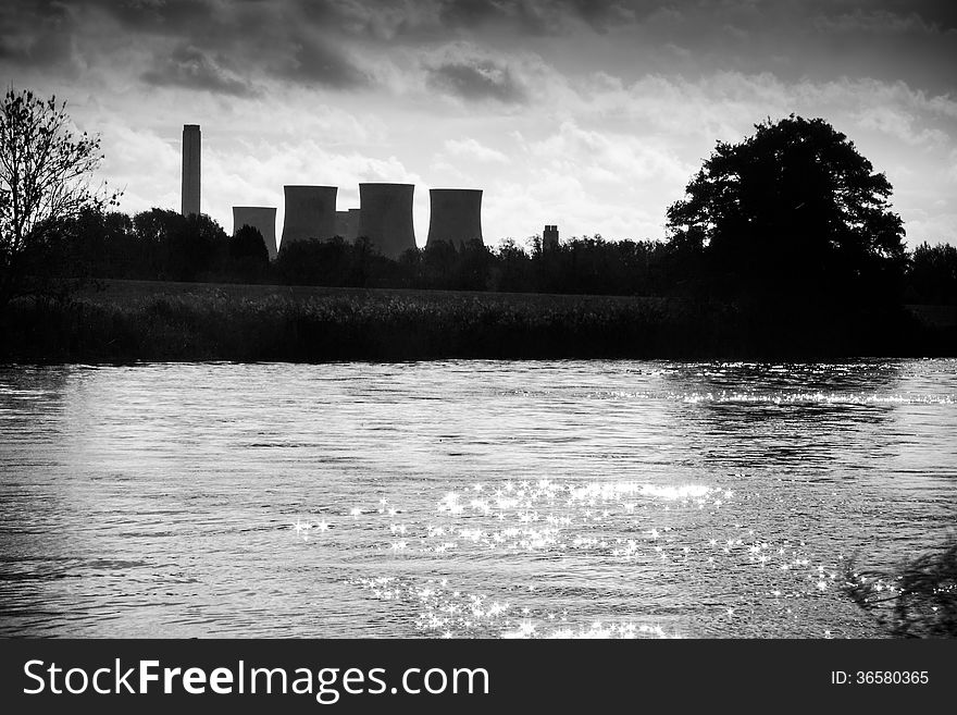 Black and white treatment of this moody power station overlooking rural scene. Black and white treatment of this moody power station overlooking rural scene