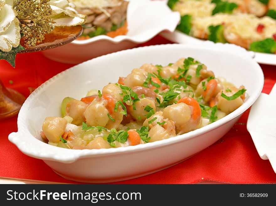 Dish of scallops and shrimp with fresh herbs