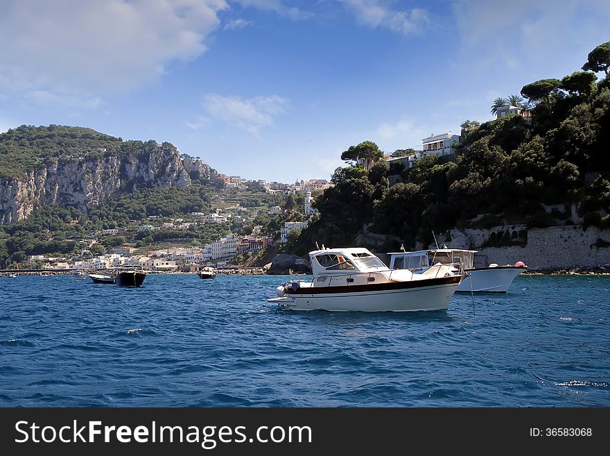 Yachts anchored in the north coast of Capri island in Italy. Yachts anchored in the north coast of Capri island in Italy