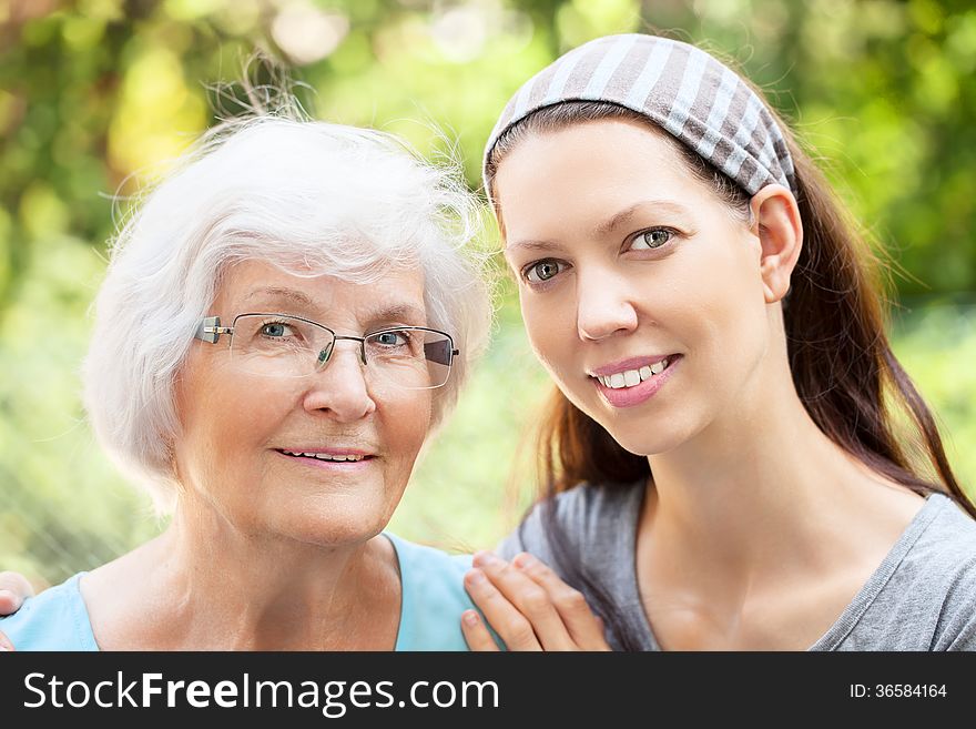 Happy senior women portrait together with granddaughter. Happy senior women portrait together with granddaughter