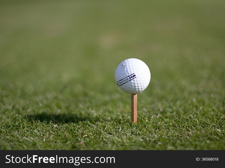 A golf ball on an unusual tee