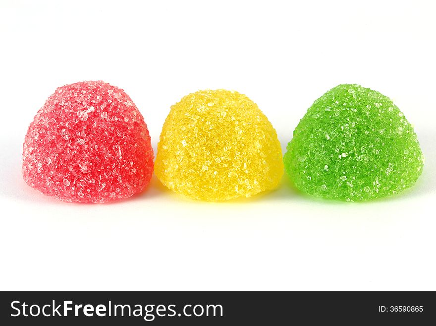 Delicious sweet multicolored different marmalade on white background. Delicious sweet multicolored different marmalade on white background