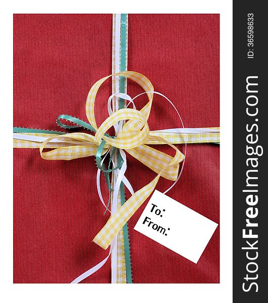 Gift With Bows And An Empty Tag With Room For Your Text