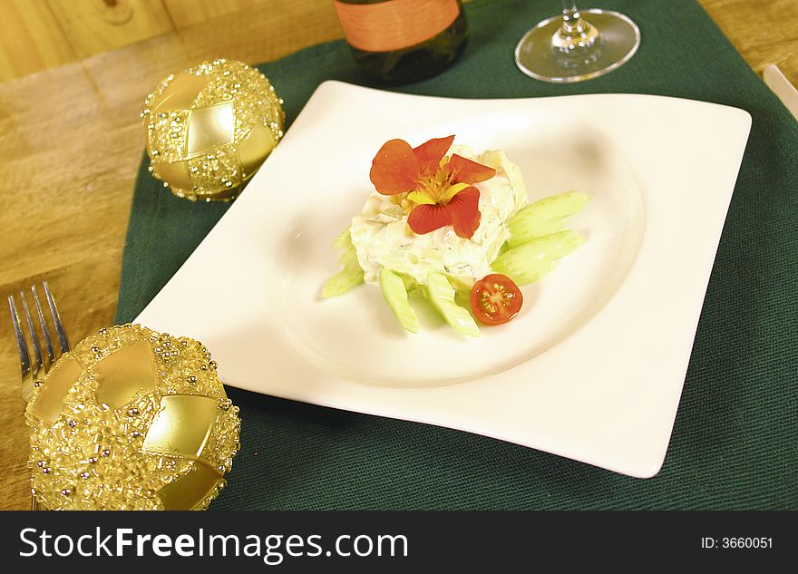 Apple salad with christmas decoration and eatible flower. Apple salad with christmas decoration and eatible flower
