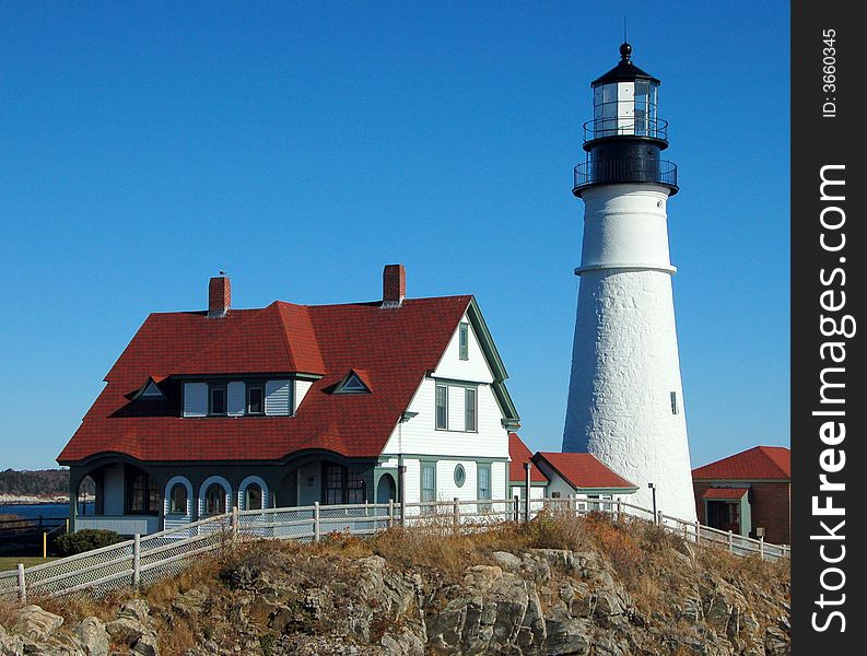Lighthouse overlooking Atlantic Ocean near Portland, Maine. Lighthouse overlooking Atlantic Ocean near Portland, Maine