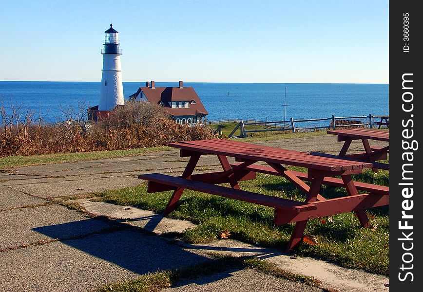 Lighthouse overlooking Atlantic Ocean near Portland, Maine. Lighthouse overlooking Atlantic Ocean near Portland, Maine