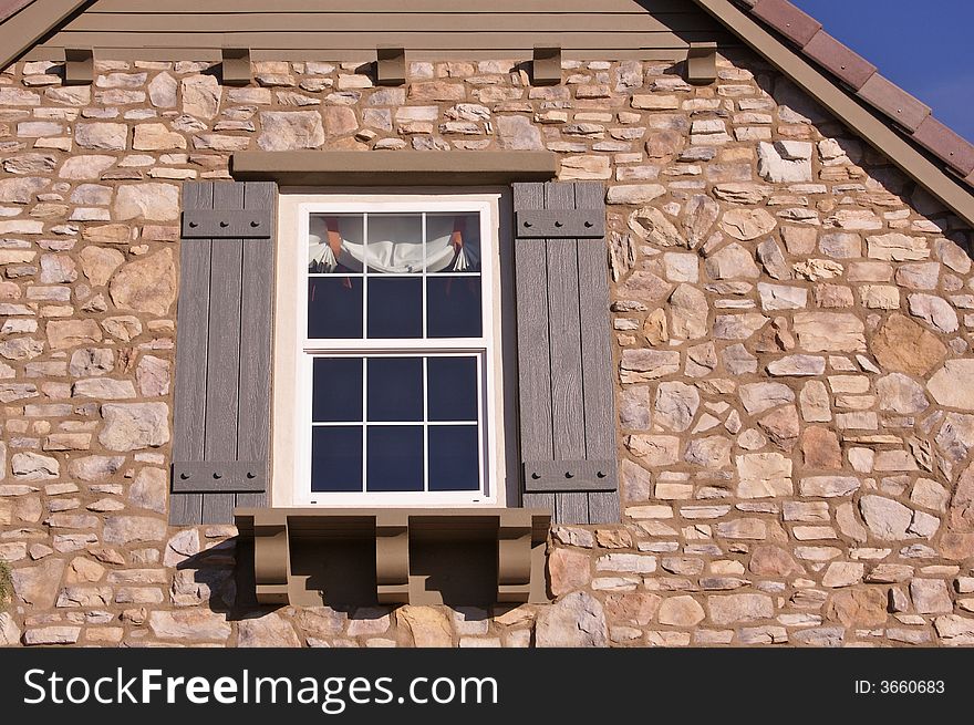 Abstract of newly constructed, modern home facade. Abstract of newly constructed, modern home facade.