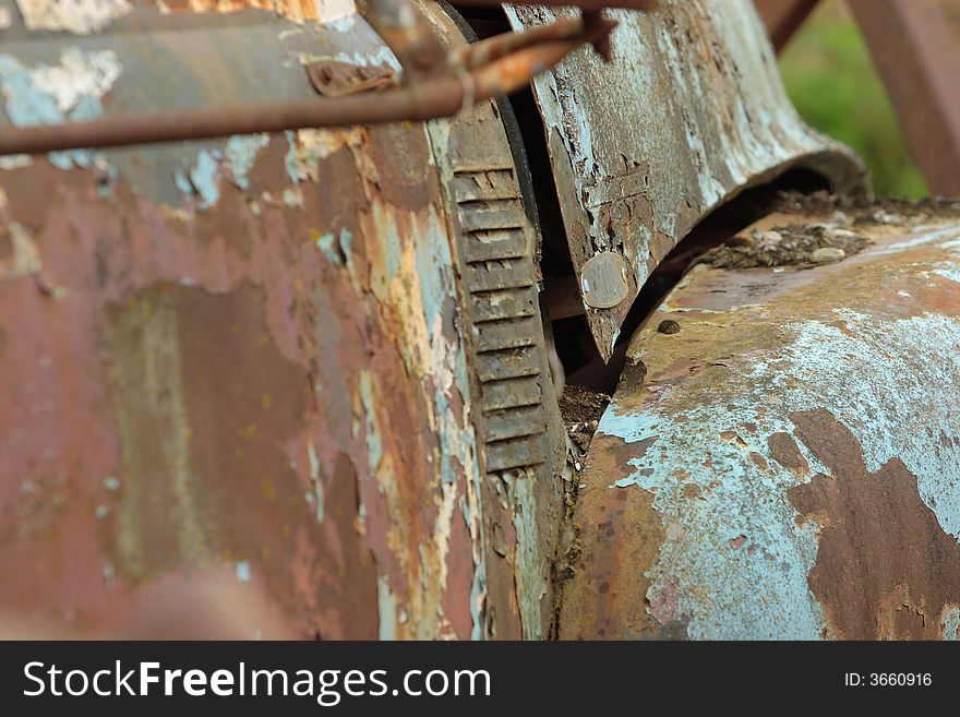 Rusty metal side panels of an old abandoned truck. Rusty metal side panels of an old abandoned truck.