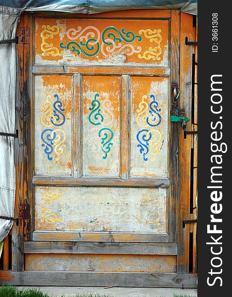 The door of a  traditional homes of nomads in Mongolia. The door of a  traditional homes of nomads in Mongolia.