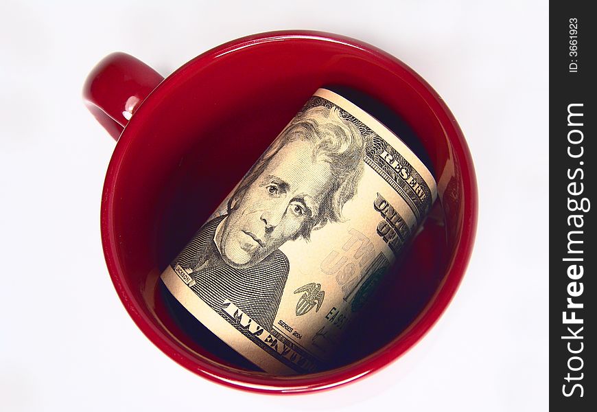 US 20 Dollars Bills In A Mug