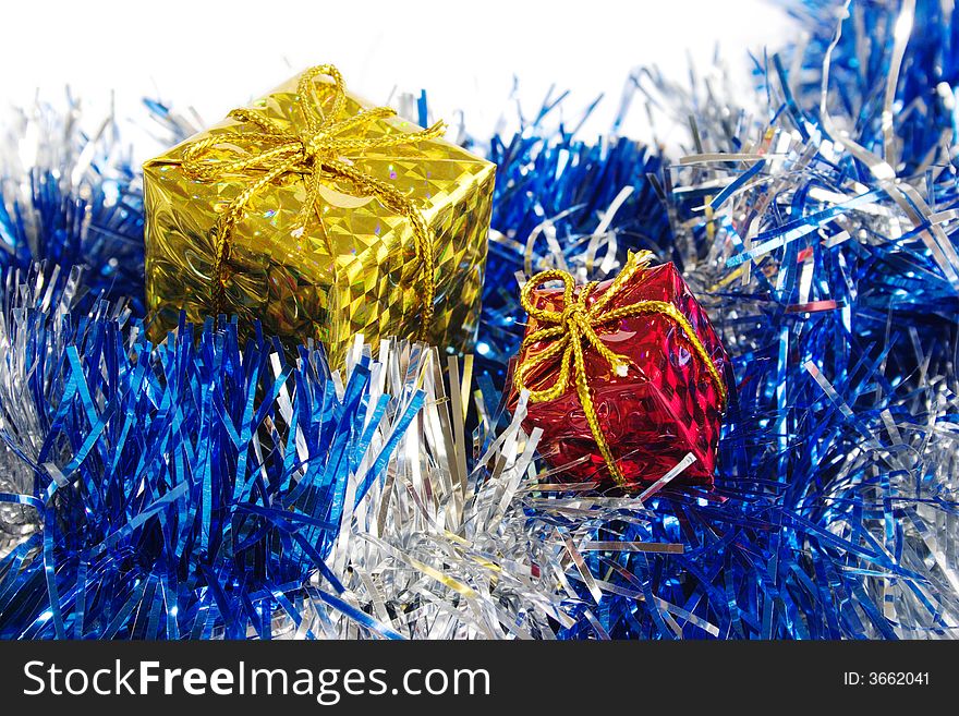 The packed gifts on blue decoration. Close-up view. The packed gifts on blue decoration. Close-up view