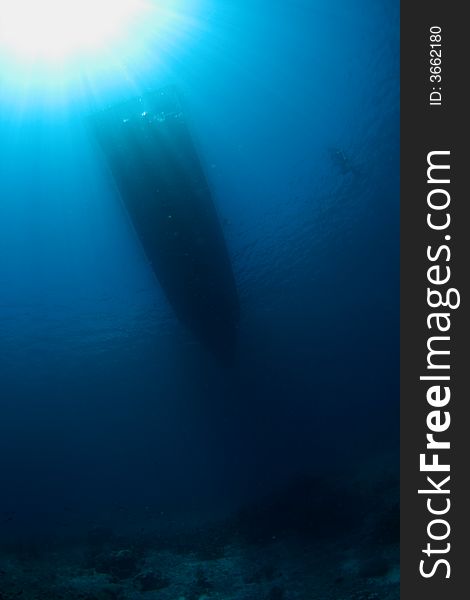 View from underwater with diver and boat. Location : Bunaken island, Manado, North Sulawesi , Indonesia. View from underwater with diver and boat. Location : Bunaken island, Manado, North Sulawesi , Indonesia