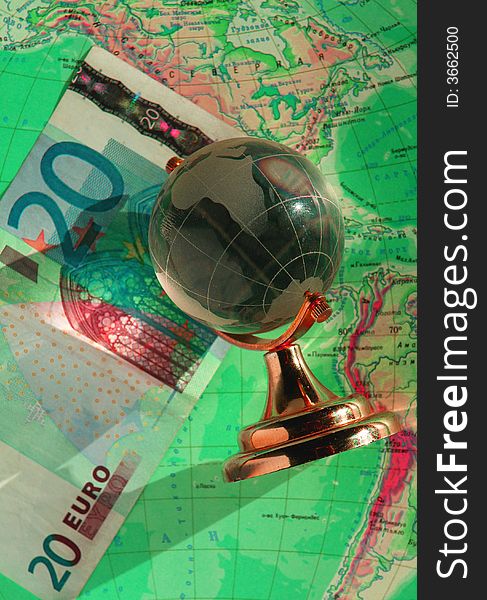 Euros globe on a background of a card