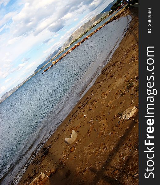 Beach view in winter under a cloudy sky morning