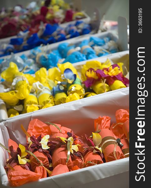 Colorful Bon-bons or Christmas crackers being sold on Christmas gift market. Colorful Bon-bons or Christmas crackers being sold on Christmas gift market.
