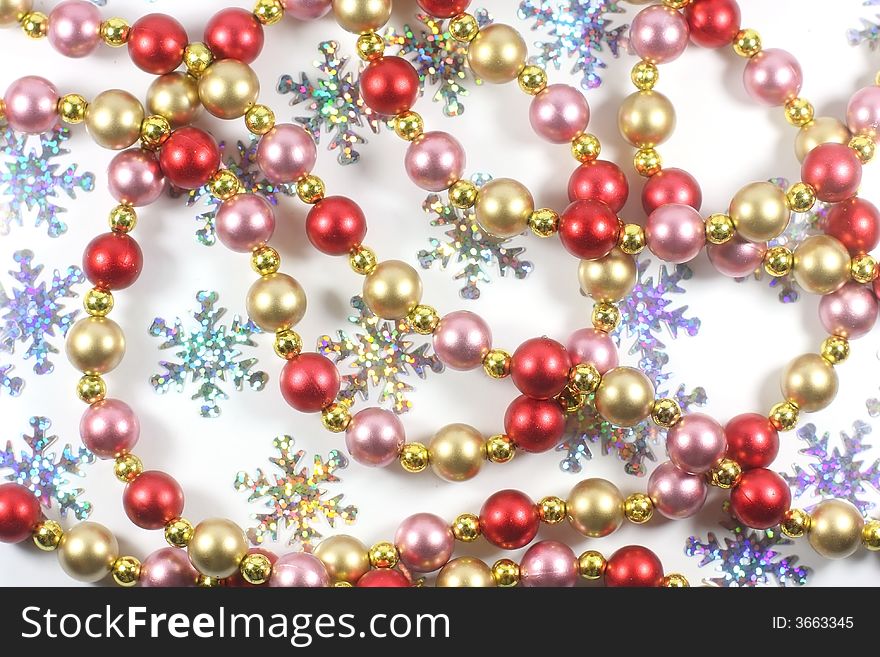 Christmas decoration of shining beads and snowflakes. Christmas decoration of shining beads and snowflakes