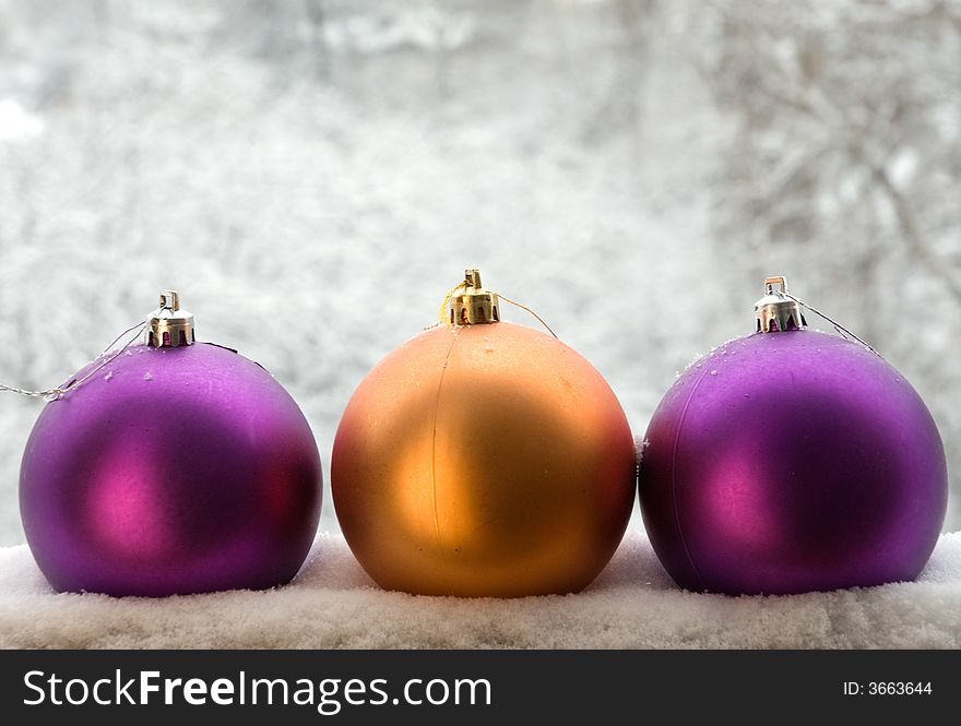 Christmas window with multi-colored balls