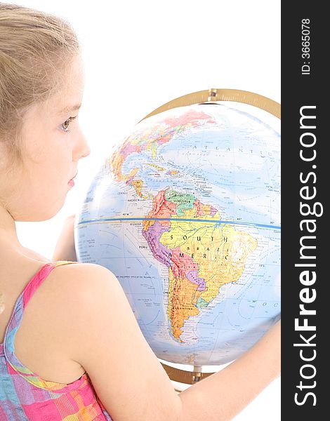 Photo of a little girl holding globe from behind