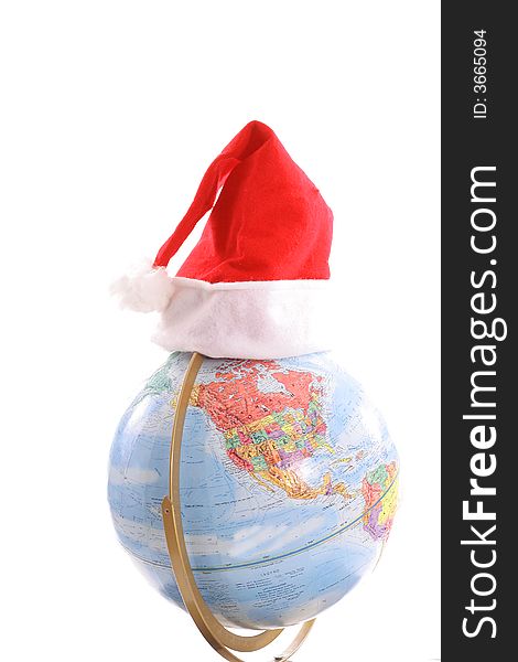 Shot of a globe with santa hat vertical
