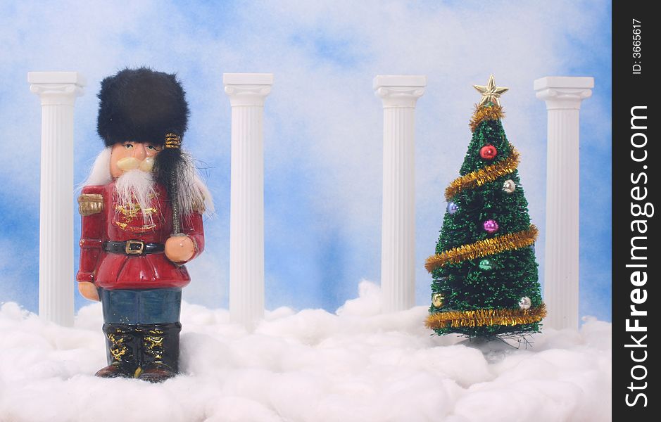 Nutcracker With Christmas Tree on Blue Sky Background. Nutcracker With Christmas Tree on Blue Sky Background
