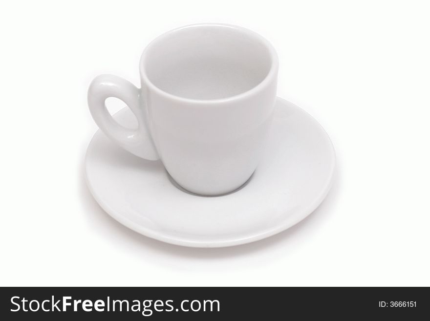 White cup on the white saucer. White cup on the white saucer