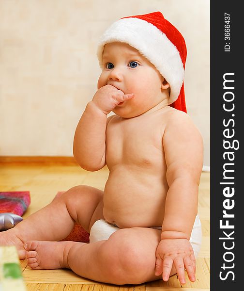 Adorable baby in Christmas hat