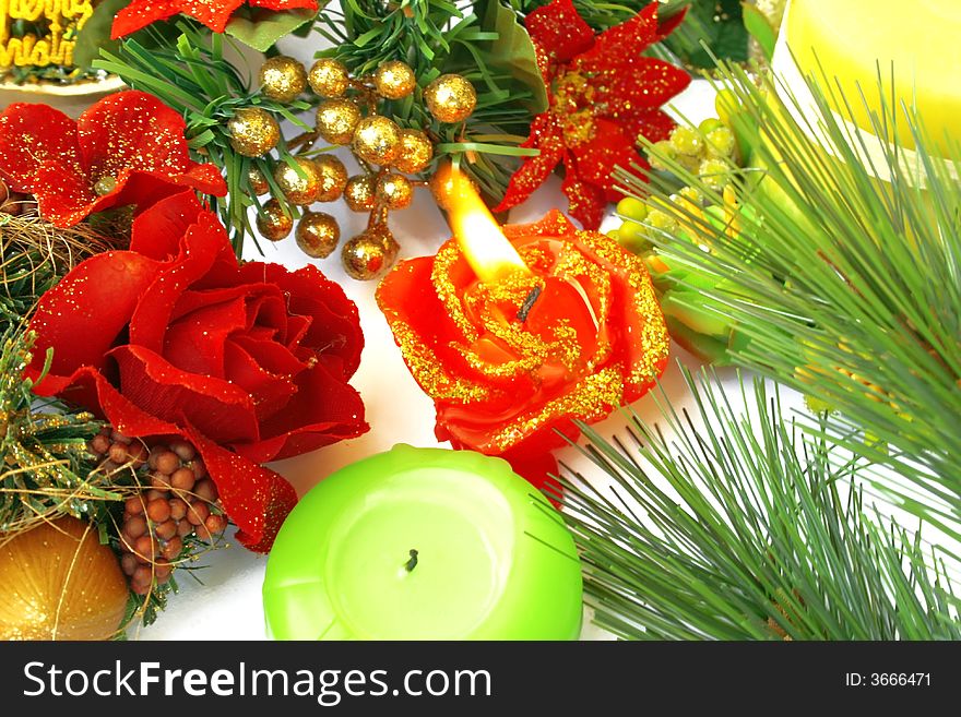 Christmas ornaments.Candles,fir-tree,holly-berry,rose.