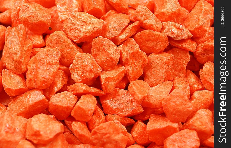 A close-up of orange-colored stones. A close-up of orange-colored stones