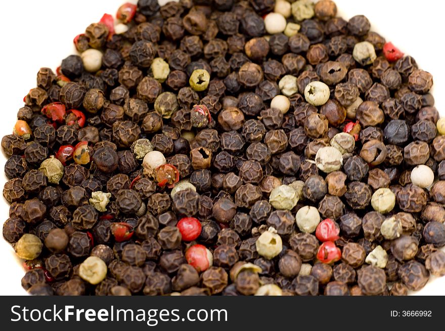 Dried colorful peppercorns in  a bowl. Dried colorful peppercorns in  a bowl