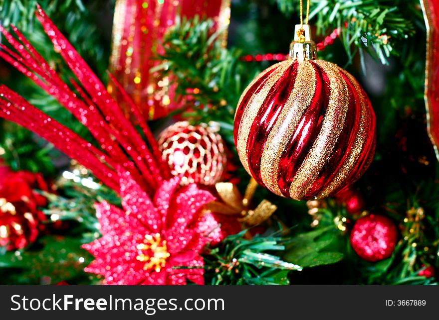 Christmas decor hanging on a tree. Christmas decor hanging on a tree