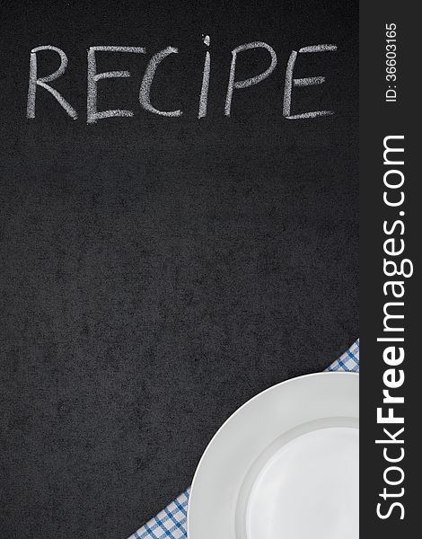 Recipe title is written in chalk on a blackboard and plate on na