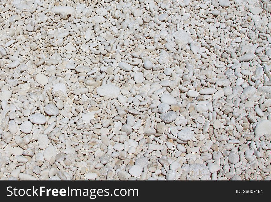 Small white pebbles on the beach