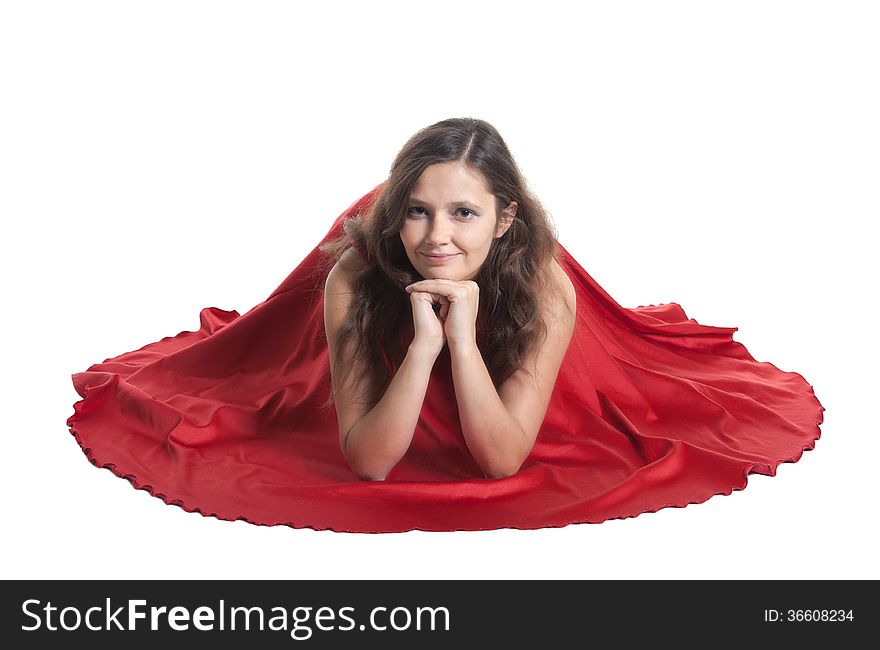 Beautiful woman sitting on the floor, white background