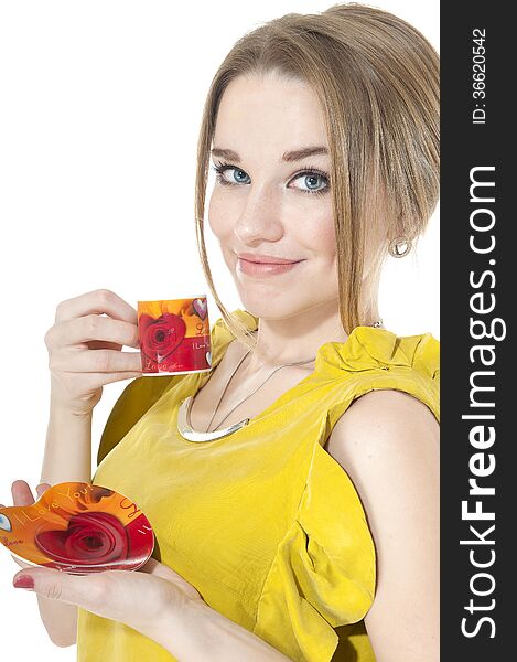 Dreamy woman with cup of coffee on a plate, isolated on white background.