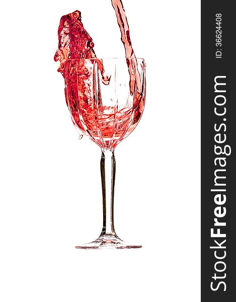 Red wine splashing in crystal glass. Red wine splashing in crystal glass