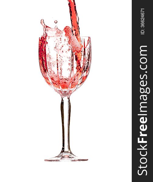 Red wine splashing in crystal glass. Red wine splashing in crystal glass