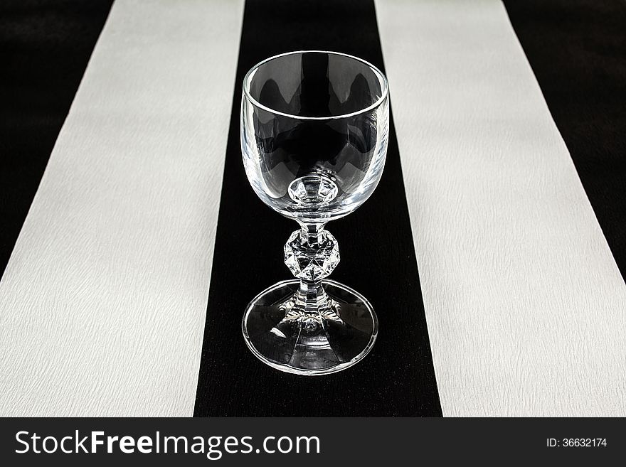 Glass for alcoholic beverages on the original background