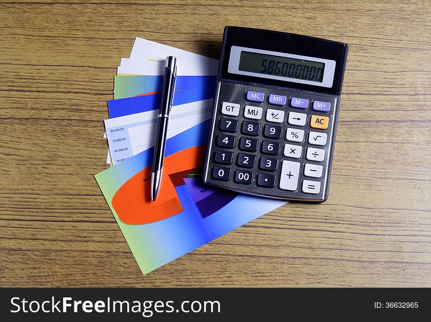 Chart, Calculator & Pen, Accounting and Finance Concept
