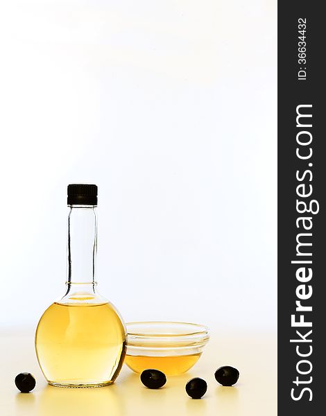 Olive oil. Against a light background