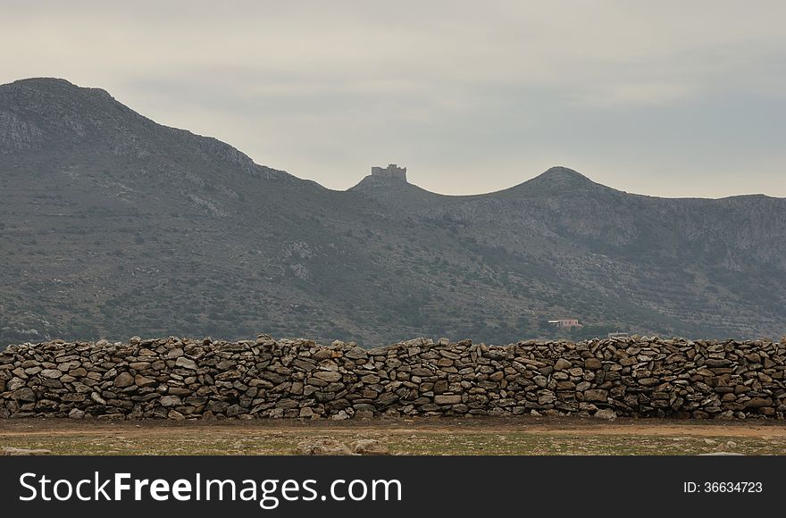 Sicily landscape, stone wall and fortress. Sicily landscape, stone wall and fortress