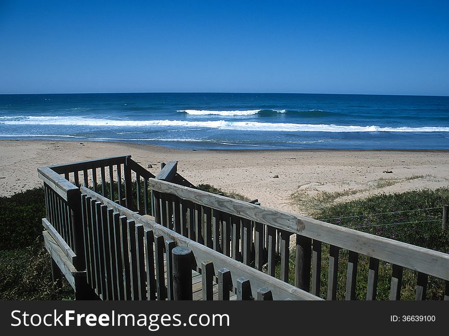 A wooden walkway down to the beach on the north coast of NSW