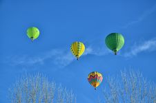 Four Hot Air Balloons In The Air Stock Images