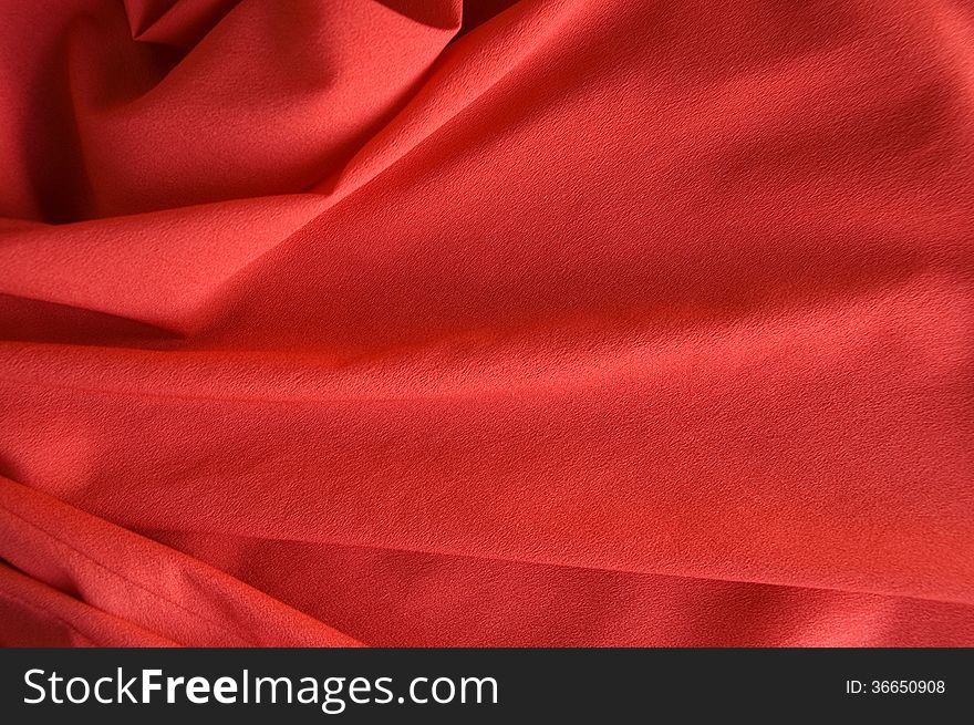 Curve of red fabric background