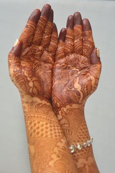 Indian Brides Hands With Henna Stock Image