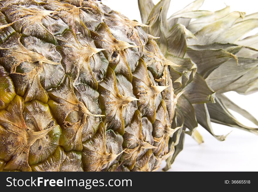 Pineapple closeup isoladed on white background