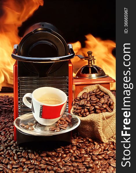 Capsule Coffee machine with  espresso cup near fireplace