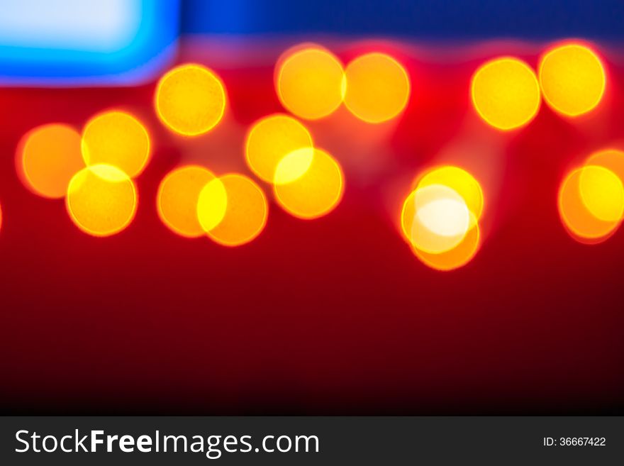 Abstract background of blurred lights with bokeh effect